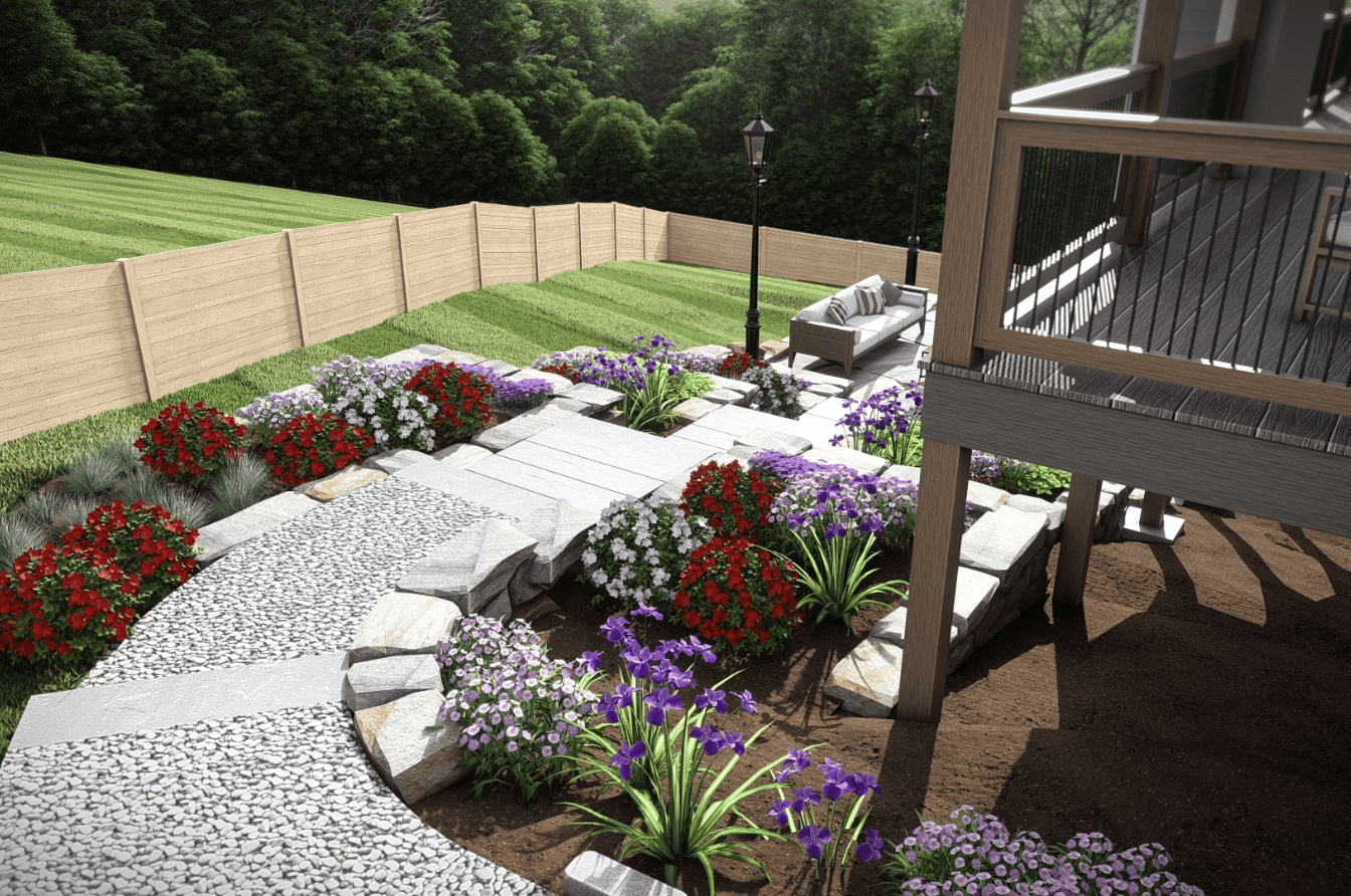 LD1 Custom landscape design in Etowah, NC, featuring a vibrant pathway lined with colorful flowers, neatly arranged stones, and a cozy seating area under a wooden deck for outdoor relaxation.